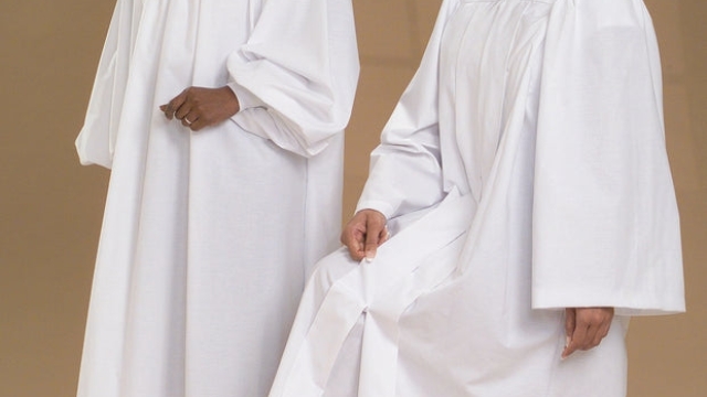 Flowing Through Faith: The Beauty of Baptism Robes